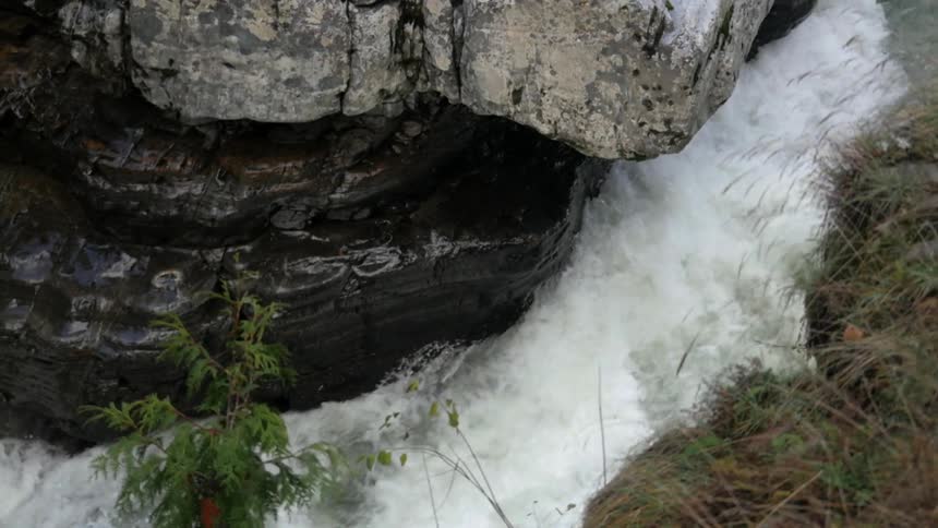 Water gushes down a hillside