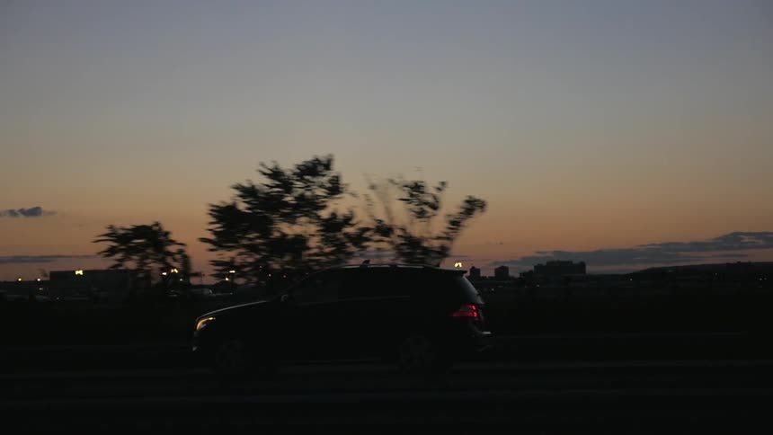 A person driving at night