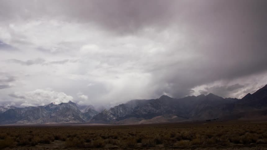 Clouds float over mountains