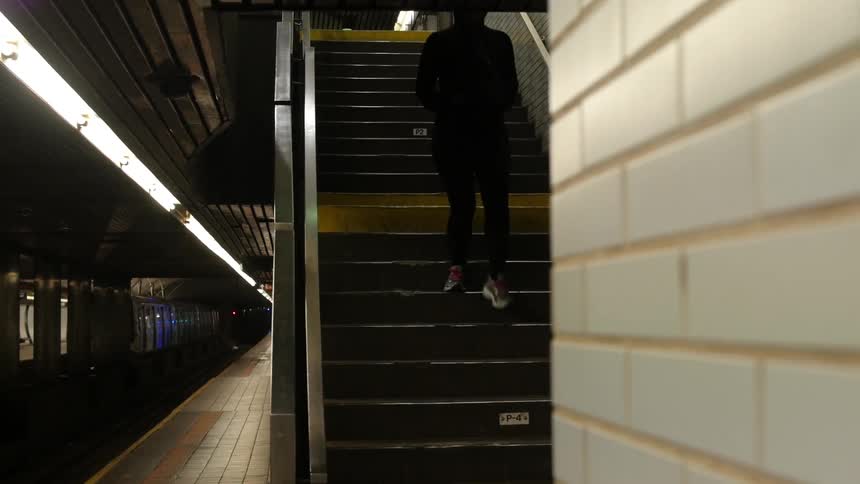 Walking into a subway station