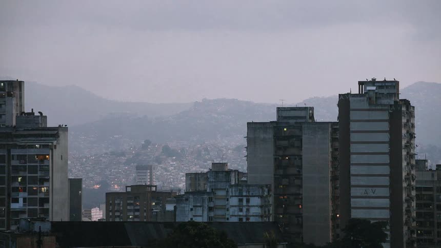 A storm rolls  into a city