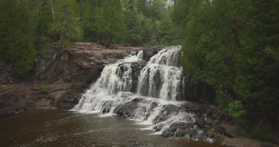 Water gushes down a waterfall