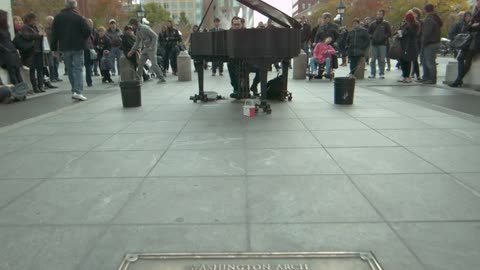 A plaque on the sidewalk