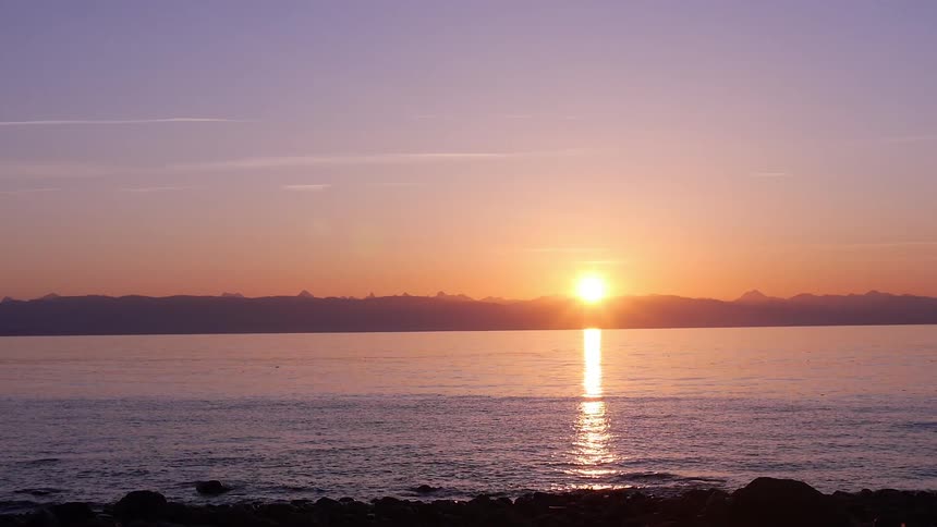 Sun goes down over the calm lake