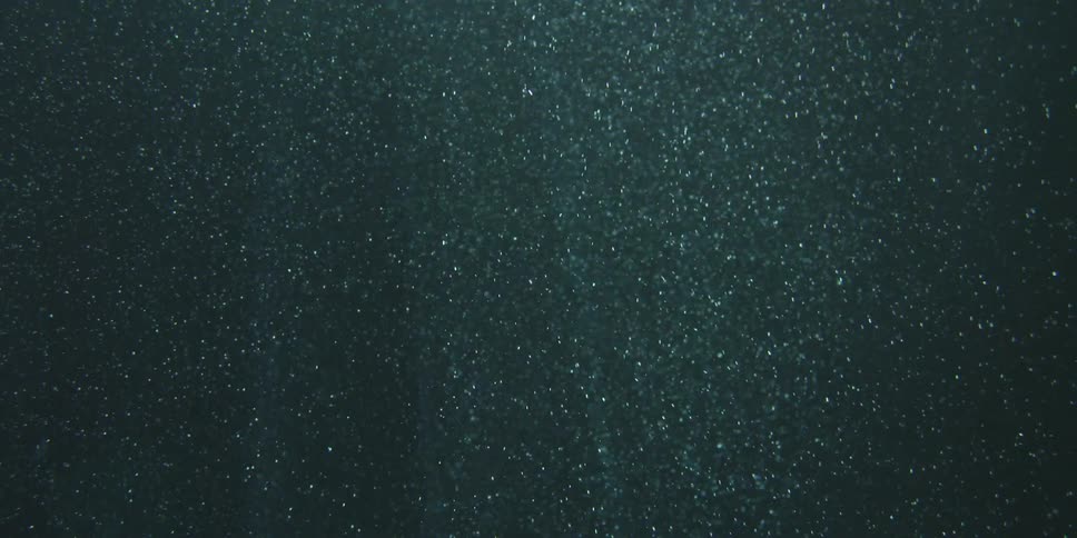 An aerial view of a blue ocean