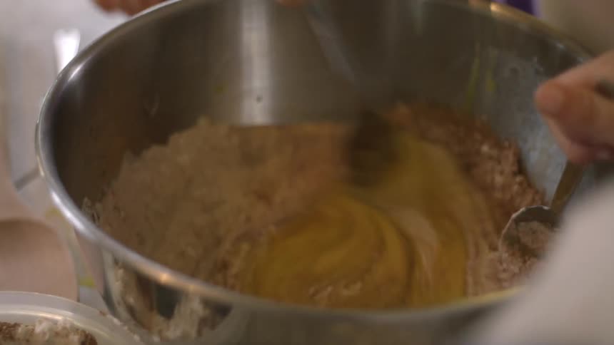 Cake mix is being stirred