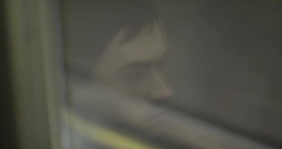 A man rides a busy bus