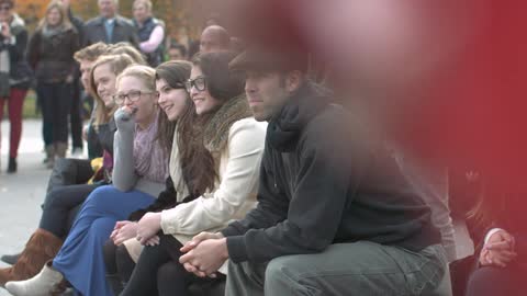 Women are watching a presentation