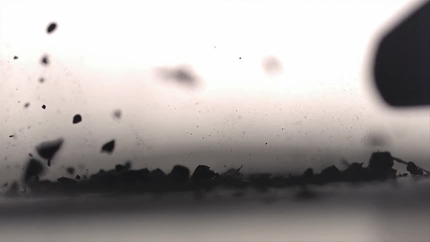 Glass vase falling and shattering